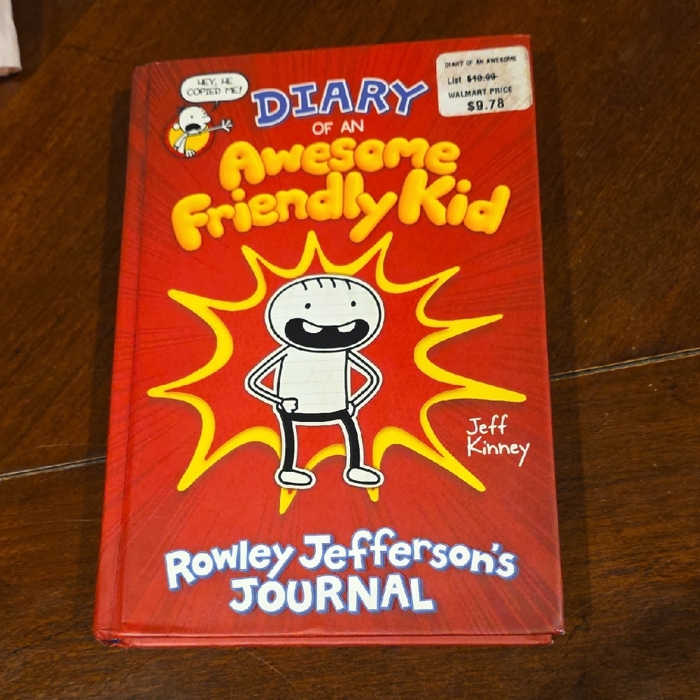 (J23) Diary of an Awesome Friendly Kid by - Vibrant Red Cover Hard Back